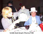 Sybille feeds Kergl's Wiarton Willi (at the Danube Swabian Club)