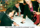 Mark DuBois surrounded by autograph hunters (Mark DuBois Concert)