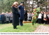 Germany's Consul General Christiane Geissler-Kuss places the first wreath (Remembrance in Kitchener)