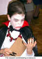 The vampire contemplating a manicure (Danube Swabian Club - Kindermaskenball)