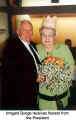 Irmgard Bunge receives flowers from the President (43 years German Canadian Club Hansa)