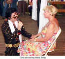 'Elvis' serenading Maria Stritzl  (Crown Foods 20th Anniversary Party)