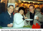 Bob Huschka, Sybille and Herwig Wandschneider enjoy the market  (Christkindl Market Kitchener)