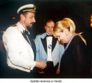 Sybille receives a medal  (Blau-Gold, Treue Husaren Toronto)