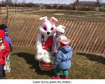 The Easter bunny greets the children