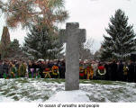 A ocean of wreaths and people