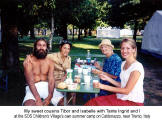 My sweet cousins Tibor and Isabelle with Tante Ingrid and I at the SOS Children's Village's own summer camp on Caldonazzo, near Trento, Italy