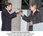 A toast on the Day of Unity 2003 - President & CEO of the TSO Andrew R. Shaw and German Consul General Dr. Klaus Rupprecht