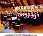 Waving the Canadian flag: the Concordia Choirs under the direction of Dr. Alfred Kunz, accompanied by Krystyna Higgins  [photo: Herwig Wandschneider]