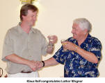 Klaus Reif congratulates Lothar Wegner