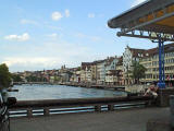 Strumming a guitar on the Limmat