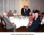 Paul Tuerr (seated right) joins a table in celebrations  [photo: Herwig Wandschneider]