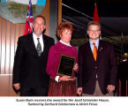 Susan Burk receives the award for the Josef Schneider House, flanked by Gerhard Griebenow & Ulrich Frisse