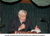 Joe Folk, President of the Danube Swabian Club, addresses the audience