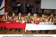 The head table of the G.K.G. Narrhalla '58 Hamilton with Heinz Ollesch, Horst Rewald, Albert Kergl, Hugh & Monika Turner, Lori & Richard Kramolowsky