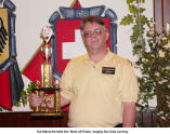 Ed Albrecht holds the "Best of Fiesta" trophy for Club Loreley