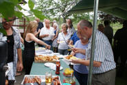 Lining up for potato salad, etc. and Piller's sausage