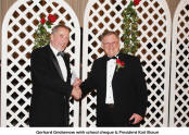 Gerhard Griebenow with school cheque & President Karl Braun